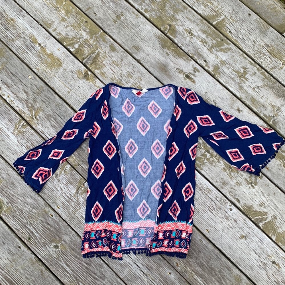 Navy, peach colored blouse